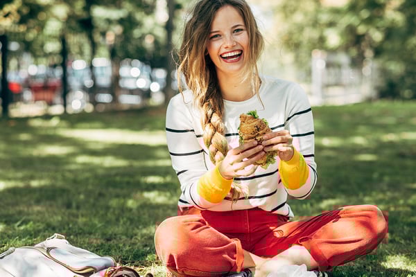 education_website_0000_dining services-get in touch-eating on grass