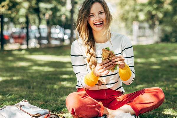 education_website_0000_dining services-get in touch-eating on grass