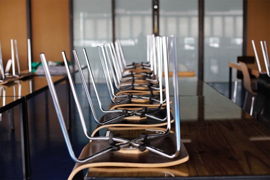 education_website_0015_custodial services-five decades of clinical cleanliness-chairs up on table in classroom