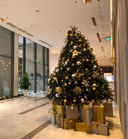 healthcare facility holiday decorations, including tree and presents