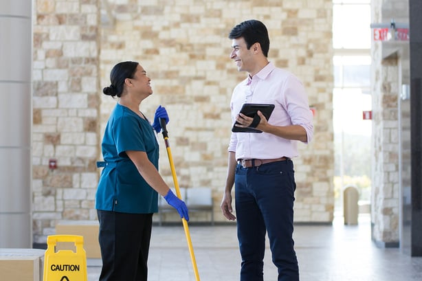 Manager and housekeeper checking in